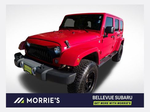 Used 2014 Jeep Wrangler Unlimited Sahara w/ Trailer Tow Group AWD/4WD image 1