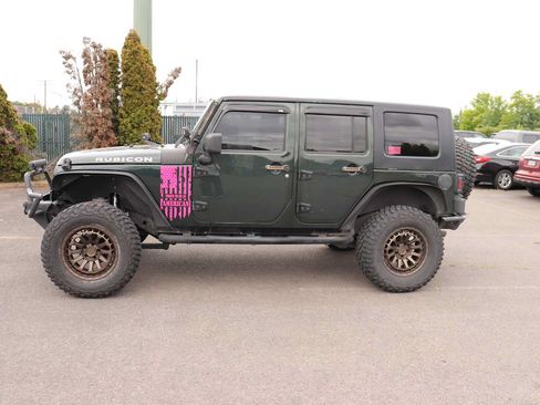 Used 2010 Jeep Wrangler Unlimited Rubicon w/ Dual Top Group AWD/4WD image 8