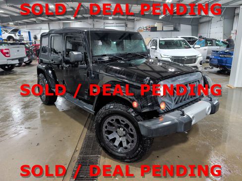 Used 2015 Jeep Wrangler Unlimited Sahara w/ Connectivity Group AWD/4WD image 1