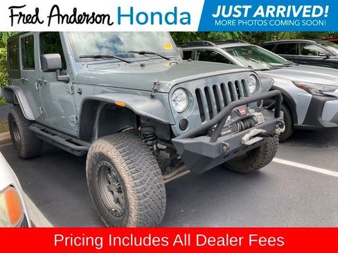 Used 2014 Jeep Wrangler Unlimited Sahara w/ Trailer Tow Group AWD/4WD image 1