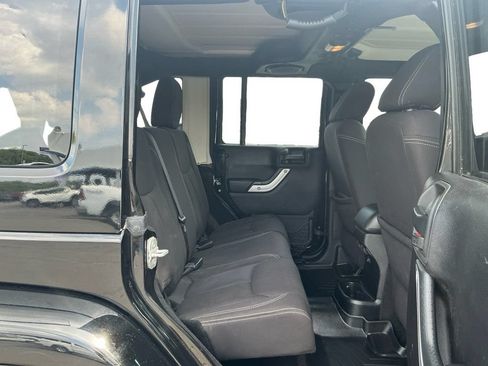 Used 2013 Jeep Wrangler Unlimited Sahara AWD/4WD image 23