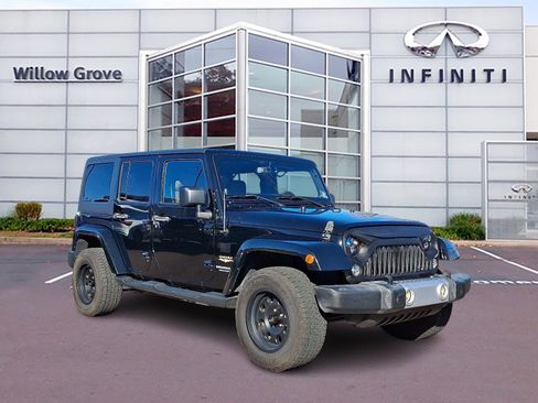 Used 2014 Jeep Wrangler Unlimited Sahara w/ Dual Top Group image 1