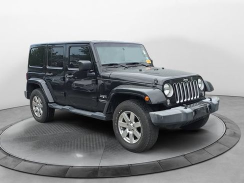 Used 2016 Jeep Wrangler Unlimited Sahara w/ Max Tow Package AWD/4WD image 7