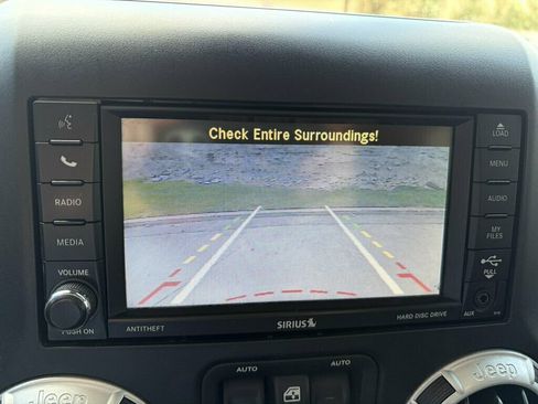 Used 2013 Jeep Wrangler Unlimited Sahara w/ Dual Top Group AWD/4WD image 21