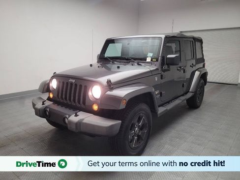 Used 2014 Jeep Wrangler Unlimited Sahara w/ Connectivity Group AWD/4WD image 1