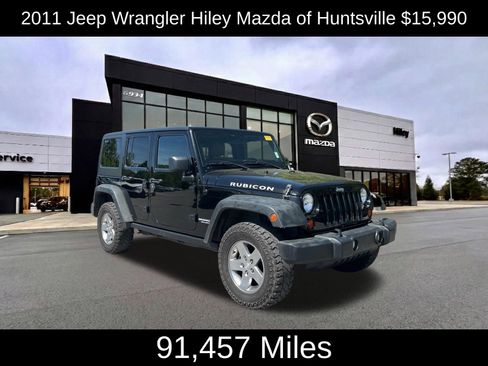 Used 2011 Jeep Wrangler Unlimited Rubicon w/ Dual Top Group image 1