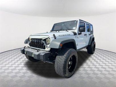 Used 2014 Jeep Wrangler Unlimited Rubicon w/ Dual Top Group