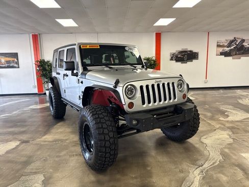 Used 2010 Jeep Wrangler Unlimited Sport AWD/4WD image 1