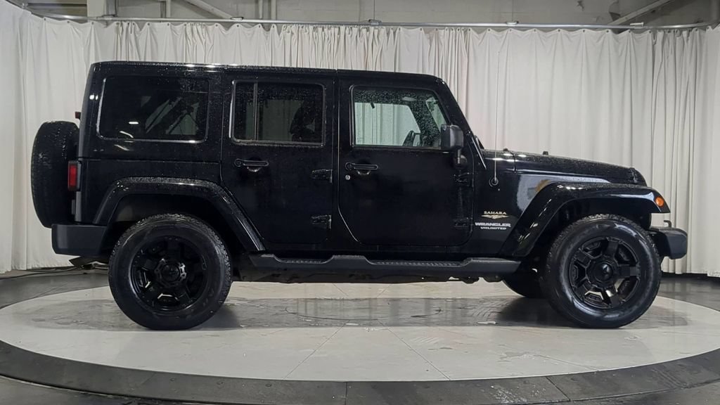 Used 2012 Jeep Wrangler Unlimited Sahara AWD/4WD image 11