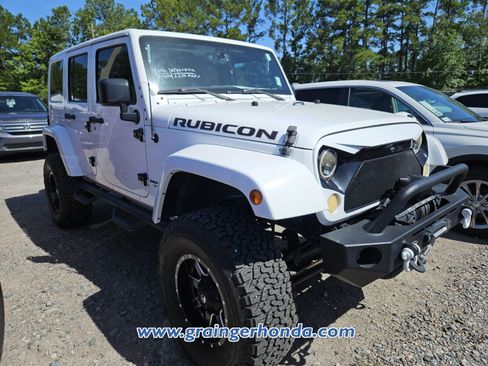 Used 2013 Jeep Wrangler Unlimited Rubicon w/ Dual Top Group AWD/4WD image 5