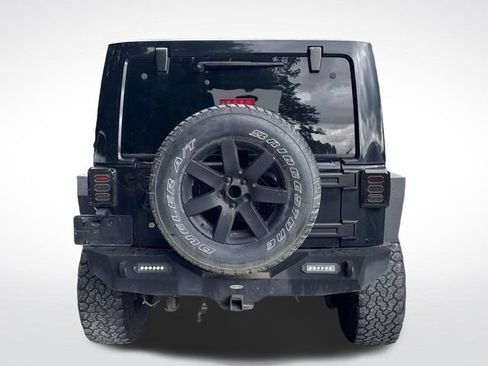 Used 2012 Jeep Wrangler Unlimited Sahara w/ Dual Top Group AWD/4WD image 6