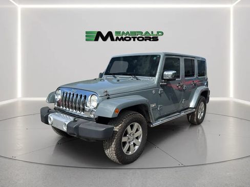 Used 2014 Jeep Wrangler Unlimited Sahara w/ Mopar Chrome Edition Group AWD/4WD image 1