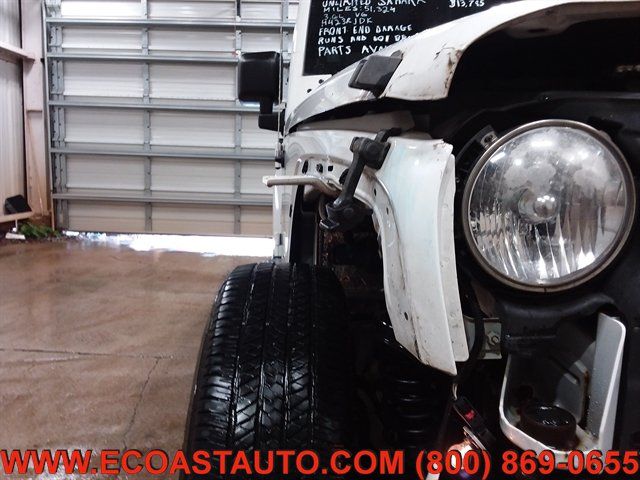 Used 2012 Jeep Wrangler Unlimited Sahara w/ Dual Top Group AWD/4WD image 16