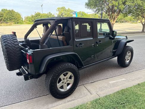 Used 2012 Jeep Wrangler Unlimited Rubicon w/ Dual Top Group AWD/4WD image 4