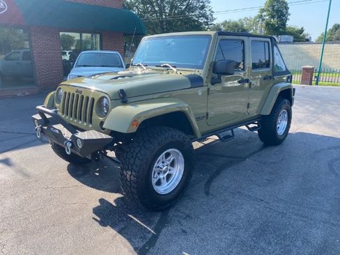 Used 2013 Jeep Wrangler Unlimited Sahara AWD/4WD image 1