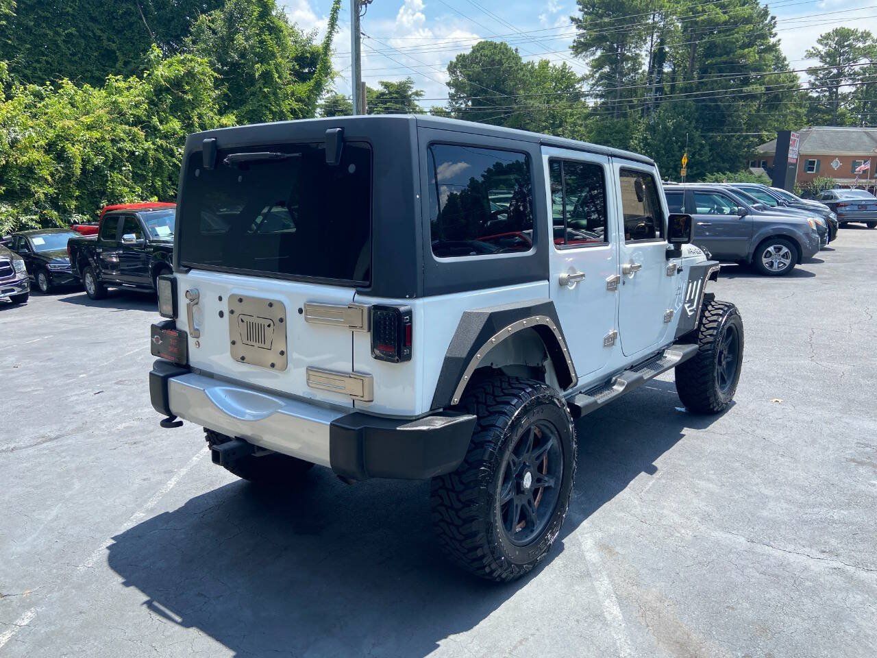Used 2013 Jeep Wrangler Unlimited Sahara AWD/4WD image 6