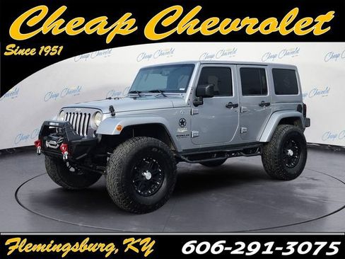 Used 2014 Jeep Wrangler Unlimited Sahara w/ Max Tow Package image 1