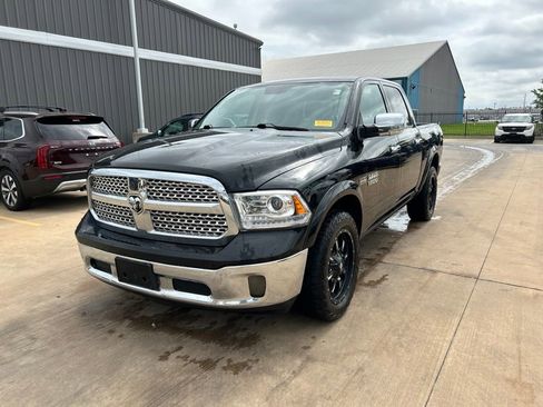 Used 2014 RAM 1500 Laramie AWD/4WD image 1