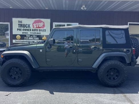 Used 2011 Jeep Wrangler Unlimited Rubicon w/ Dual Top Group AWD/4WD image 2