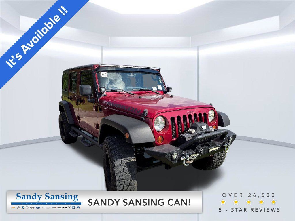 Used 2011 Jeep Wrangler Unlimited Rubicon w/ Connectivity Group AWD/4WD image 1