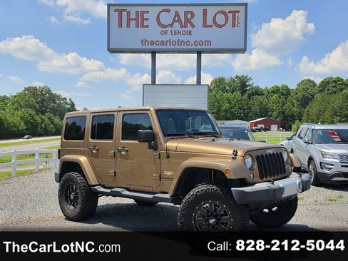 Used 2015 Jeep Wrangler Unlimited Sahara w/ Max Tow Package AWD/4WD image 1