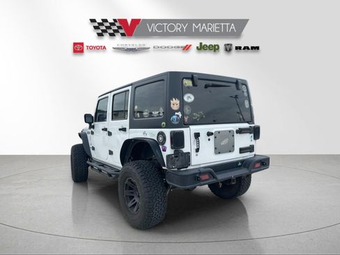 Used 2016 Jeep Wrangler Unlimited Sahara w/ Dual Top Group AWD/4WD image 3