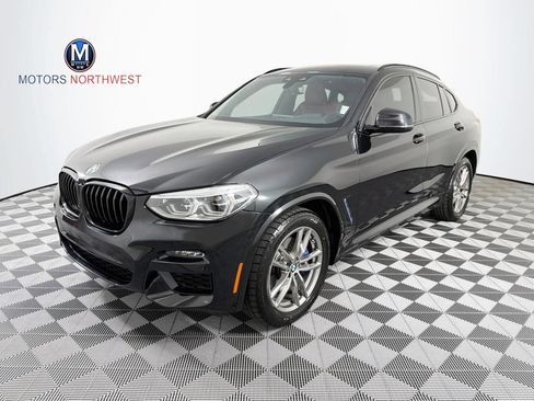 Used 2021 BMW X4 xDrive30i AWD/4WD image 1