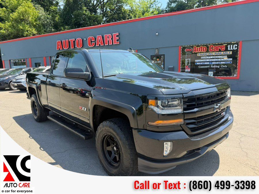 Used 2017 Chevrolet Silverado 1500 LT w/ Midnight Edition AWD/4WD image 1