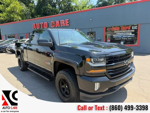 Used 2017 Chevrolet Silverado 1500 LT w/ Midnight Edition AWD/4WD image 1