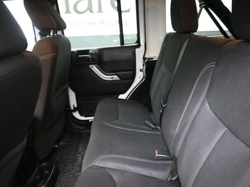 Used 2013 Jeep Wrangler Unlimited Sahara w/ Dual Top Group AWD/4WD image 22