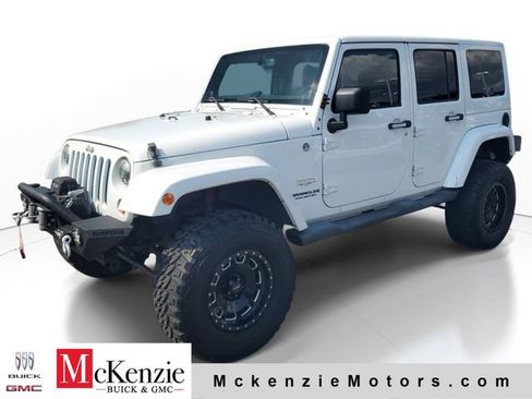 Used 2013 Jeep Wrangler Unlimited Sahara w/ Dual Top Group AWD/4WD image 2