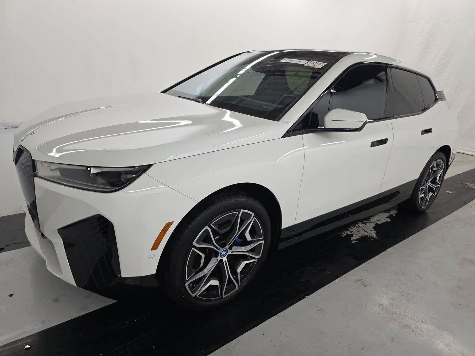 Used 2024 BMW iX xDrive50 w/ Premium Package AWD/4WD image 1