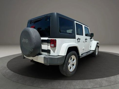 Used 2014 Jeep Wrangler Unlimited Sahara w/ Dual Top Group AWD/4WD image 5