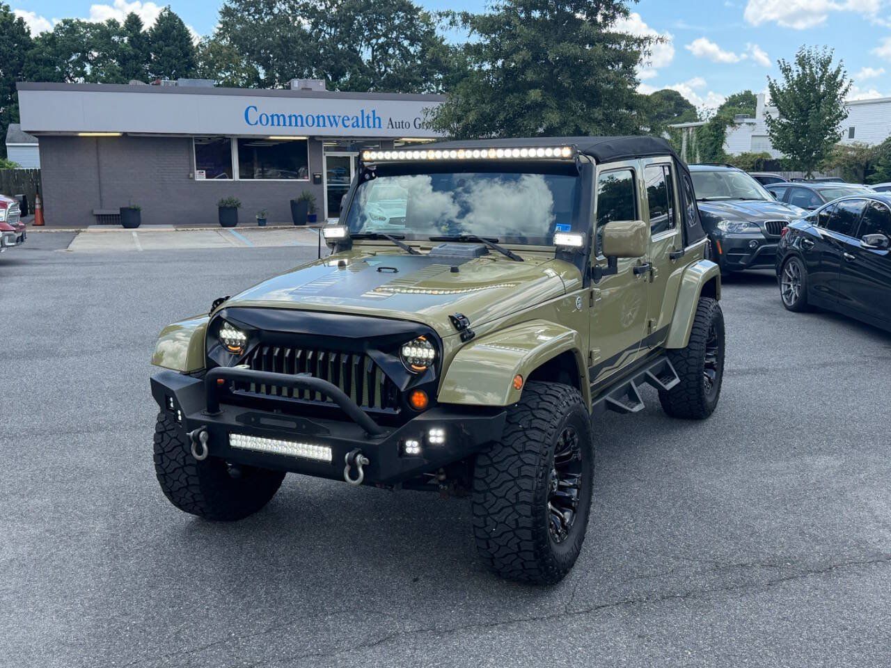Used 2013 Jeep Wrangler Unlimited Sahara w/ Dual Top Group AWD/4WD image 25