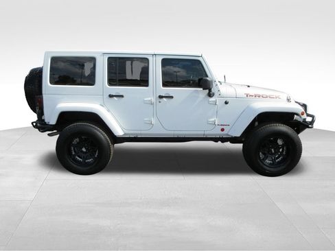 Used 2014 Jeep Wrangler Unlimited Sahara w/ Dual Top Group AWD/4WD image 6