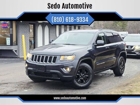 Used 2014 Jeep Grand Cherokee Laredo AWD/4WD image 1