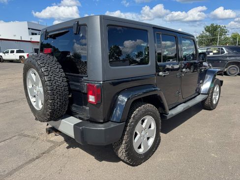 Used 2012 Jeep Wrangler Unlimited Sahara w/ Dual Top Group AWD/4WD image 5