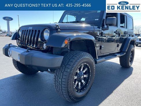 Used 2015 Jeep Wrangler Unlimited Sahara w/ Dual Top Group image 1