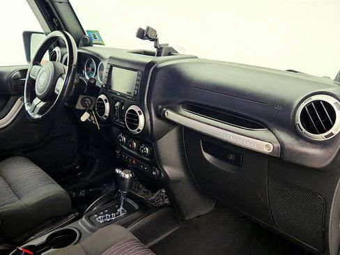 Used 2012 Jeep Wrangler Unlimited Sahara w/ Dual Top Group AWD/4WD image 25