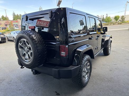 Used 2015 Jeep Wrangler Unlimited Rubicon w/ Dual Top Group AWD/4WD image 9