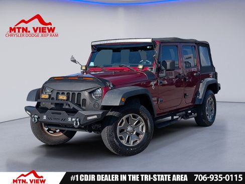 Used 2012 Jeep Wrangler Unlimited Sport AWD/4WD image 1