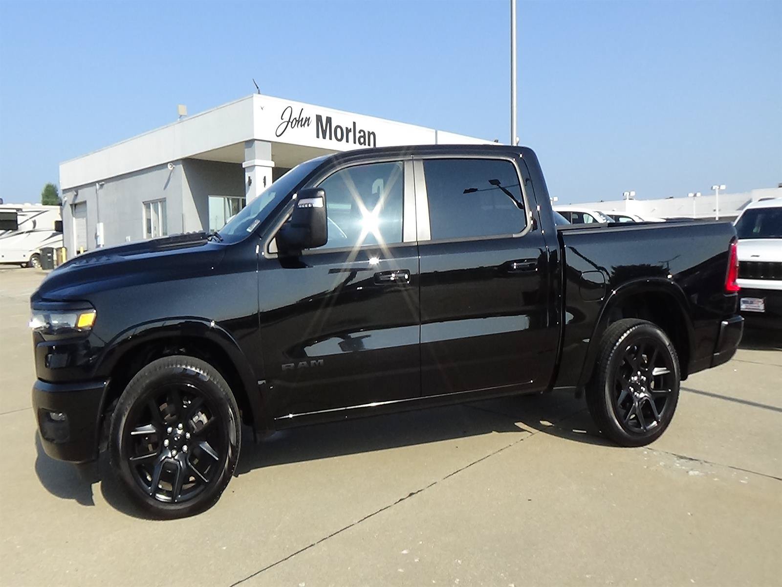 Used 2025 RAM 1500 Laramie w/ Night Edition AWD/4WD image 1