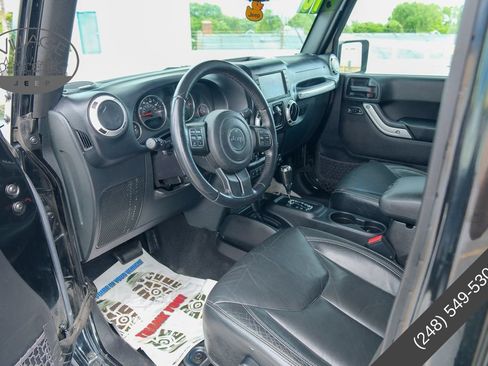 Used 2016 Jeep Wrangler Unlimited Sahara w/ Dual Top Group AWD/4WD image 14