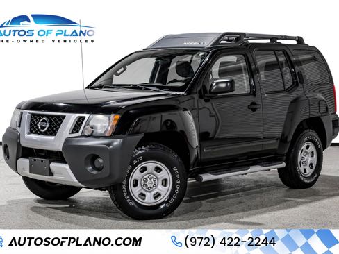 Used 2015 Nissan Xterra X AWD/4WD image 1