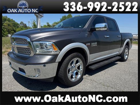 Used 2015 RAM 1500 Laramie w/ Convenience Group AWD/4WD image 1