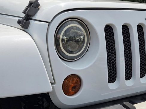 Used 2012 Jeep Wrangler Unlimited Sahara w/ Connectivity Group AWD/4WD image 3