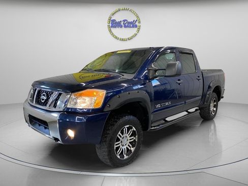Used 2012 Nissan Titan SV w/ SV Premium Utility Pkg AWD/4WD image 1