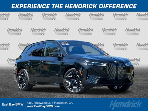 Used 2024 BMW iX xDrive50 w/ Sport Package AWD/4WD image 1