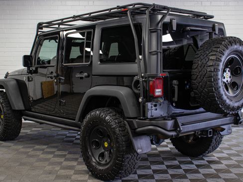 Used 2013 Jeep Wrangler Unlimited Rubicon w/ Dual Top Group AWD/4WD image 5