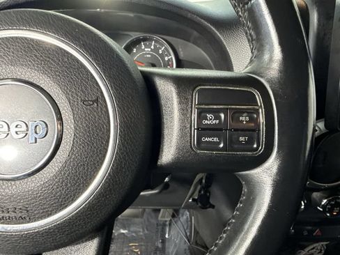Used 2014 Jeep Wrangler Unlimited Sahara w/ Dual Top Group AWD/4WD image 14